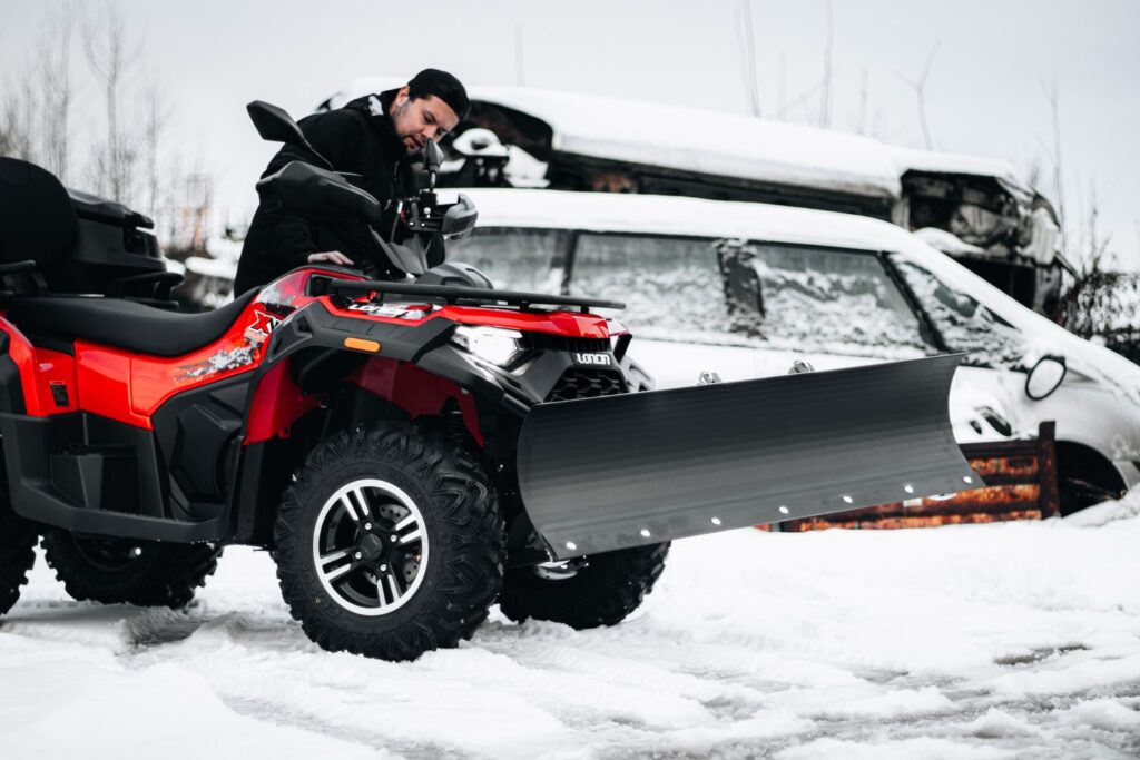 LONCIN XWolf 550: A Powerful Tool for Efficiently Clearing Snow 2 LONCIN XWolf 550 ATV with snowplow clearing snow
