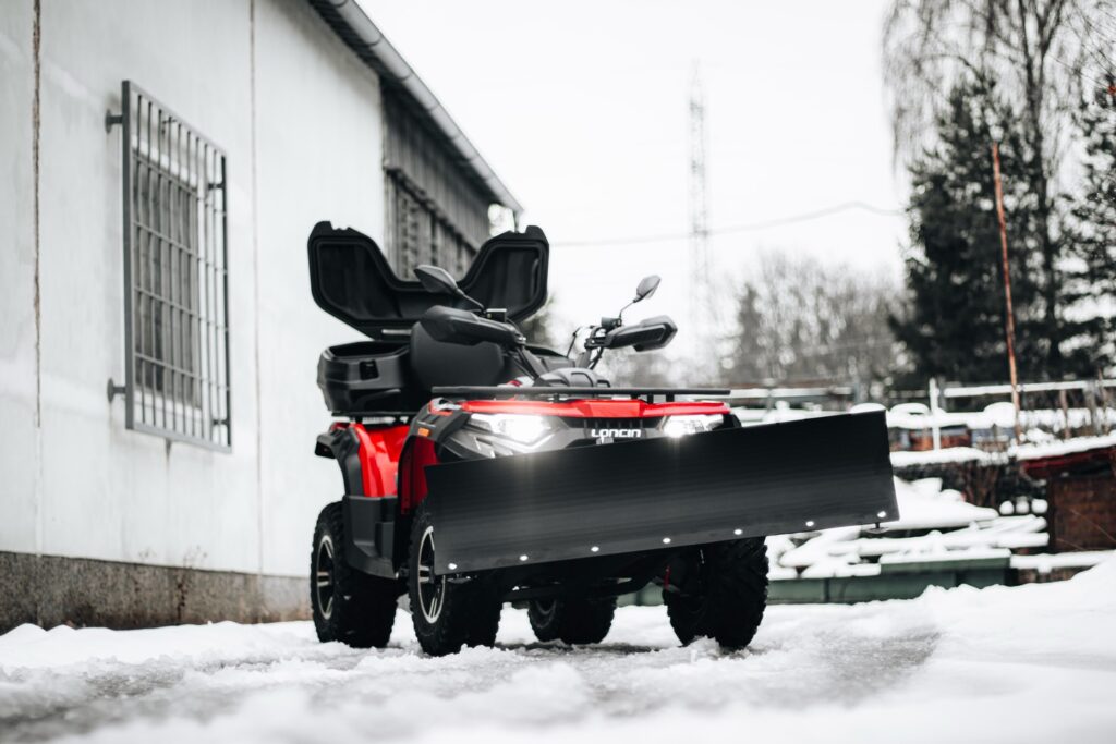 LONCIN XWolf 550: A Powerful Tool for Efficiently Clearing Snow 1 LONCIN XWolf 550 ATV clearing thick snow continuously