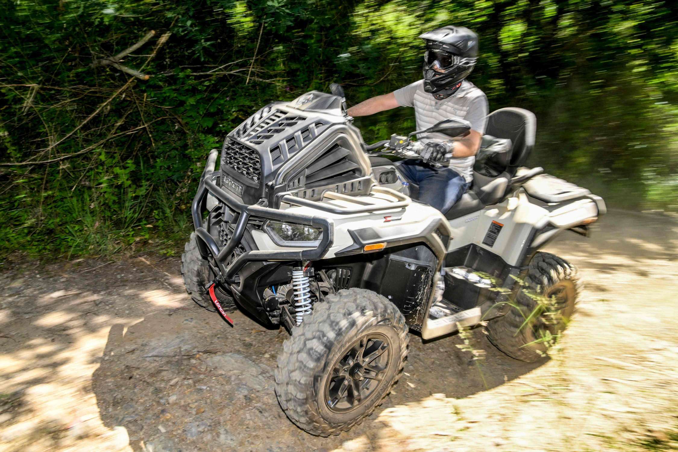 LONCIN XWolf Conquers Portugal with an 80 km Off-Road Adventure 20 LONCIN XWolf navigating rough off-road terrain with independent suspension
