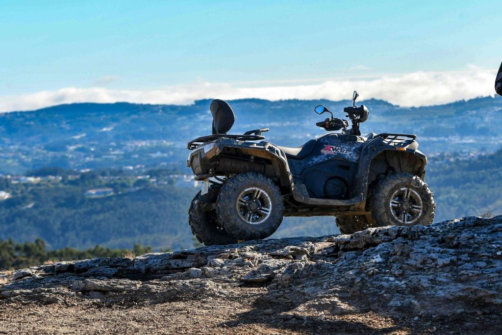 How to Choose a Hunting ATV for Different Terrains? 4 ATV underbody protection and suspension traversing rough rocky roads