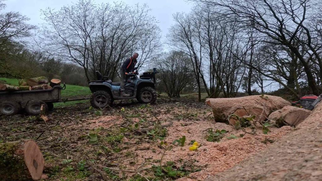 How Reliable Is the LONCIN XWOLF700L After 6 Months of Farm Use? 2 LONCIN XWOLF700L using its built-in winch and towing power to haul heavy farm equipment